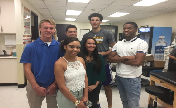 Students Posing with Lonzo
